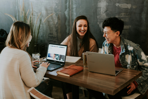 3 people working together remotely with laptops