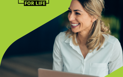 A person wearing a white shirt, is working on a laptop. The background is dark, and a green overlay with the text 'SKILLS FOR LIFE' appears in the top left corner."