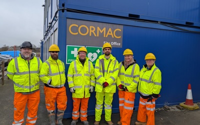 Truro and Penwith College’s Tom Lal and Hayley McKinstry with Cormac representatives on site at the Northern Access Road Project, Langarth. 